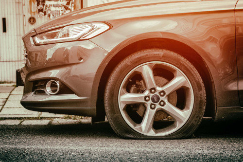 auto-insurance-flat-tire.jpg